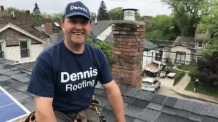 Roofers performing quality check on completed residential roof
